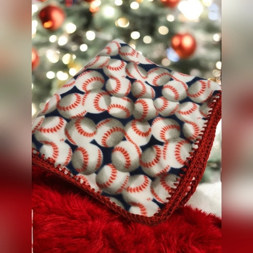 Handmade fleece child's blanket with crochet-edging